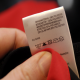 Rotolo nastro raso per etichette tessili composizioni e simboli lavaggio